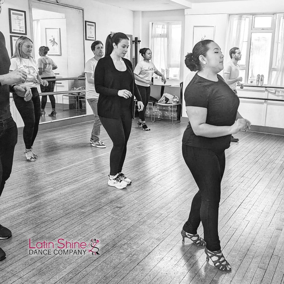 Professional Latin dance instructors teaching